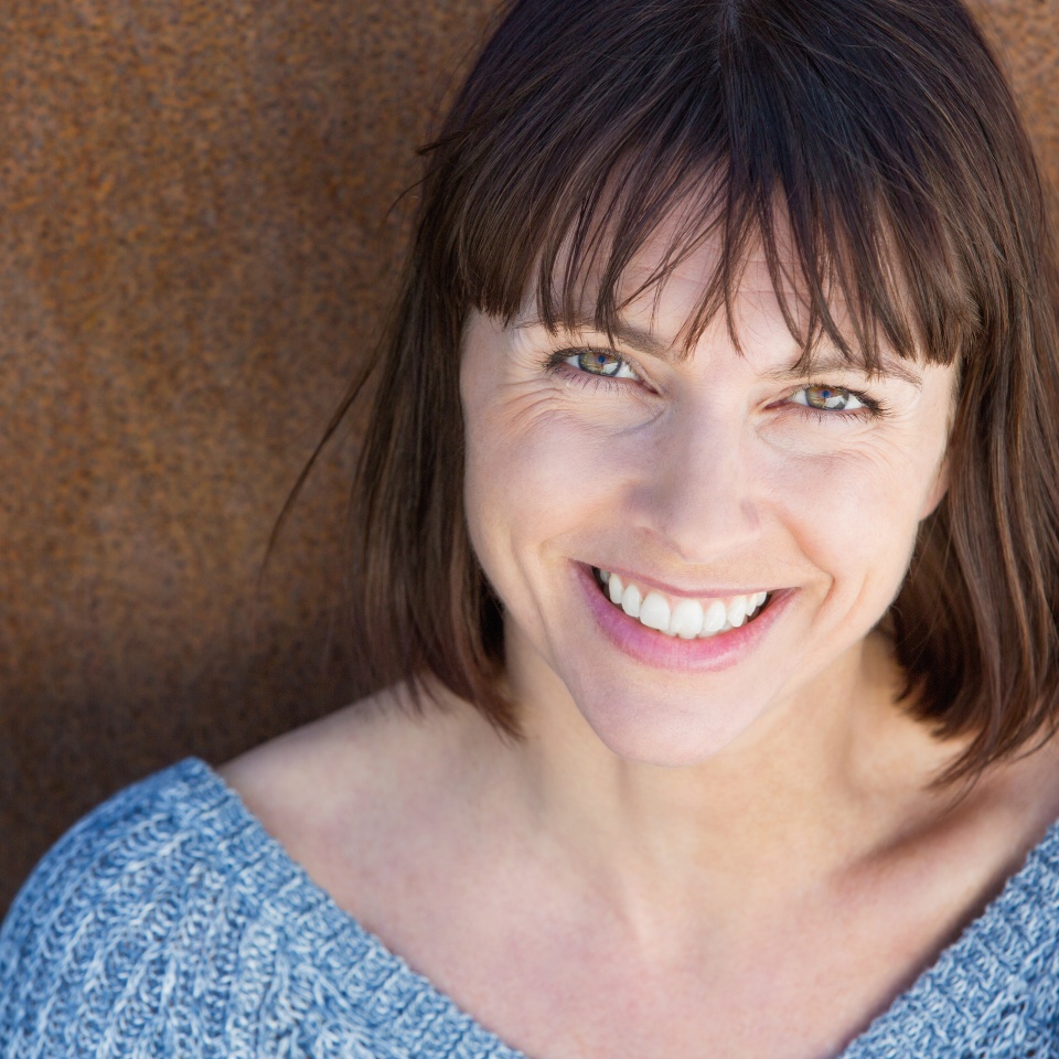 Close up portrait of a smiling middle aged woman
